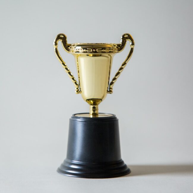 yellow and white trophy